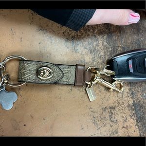 Coach light brown and brown leather key chain
